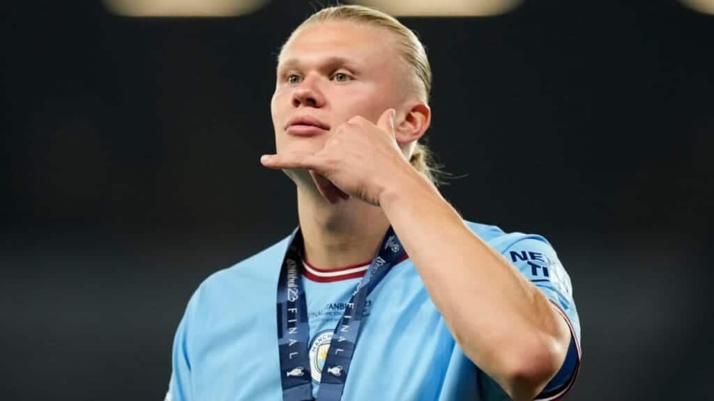 Footballer Erling Haaland playing football for Man City