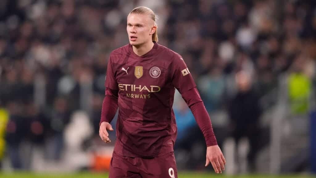 Footballer Erling Haaland playing football for Man City