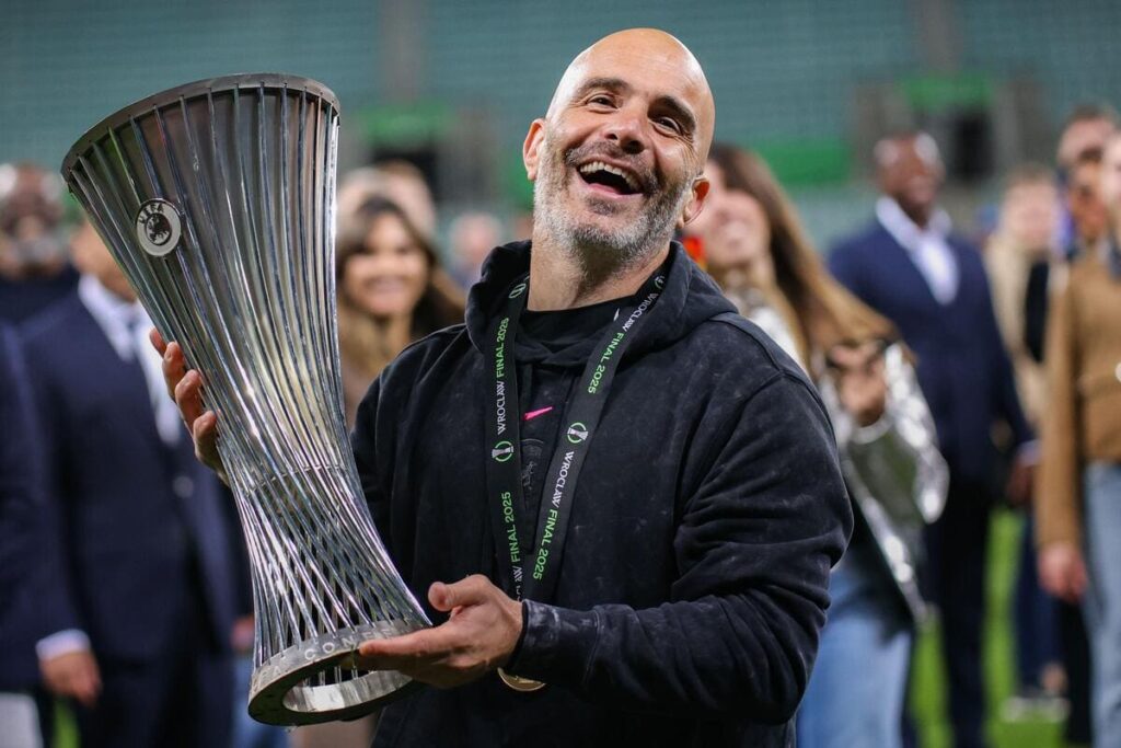 Enzo Maresca lifts the Conference League trophy for Chelsea