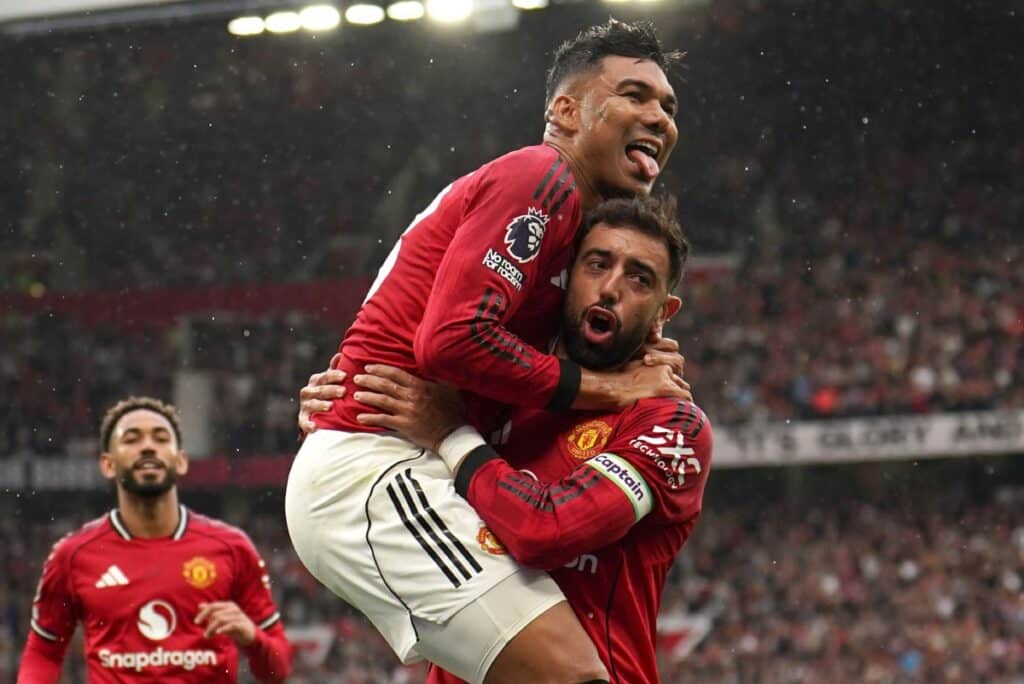 Casemiro and Bruno Fernandes playing for Manchester United Football Club