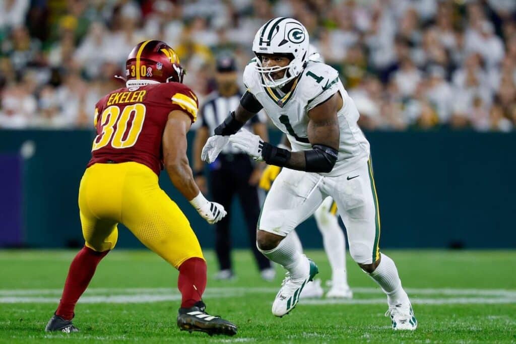 Green Bay Packers defensive end Micah Parsons comes face-to-face with a Washington Commanders offensive player.