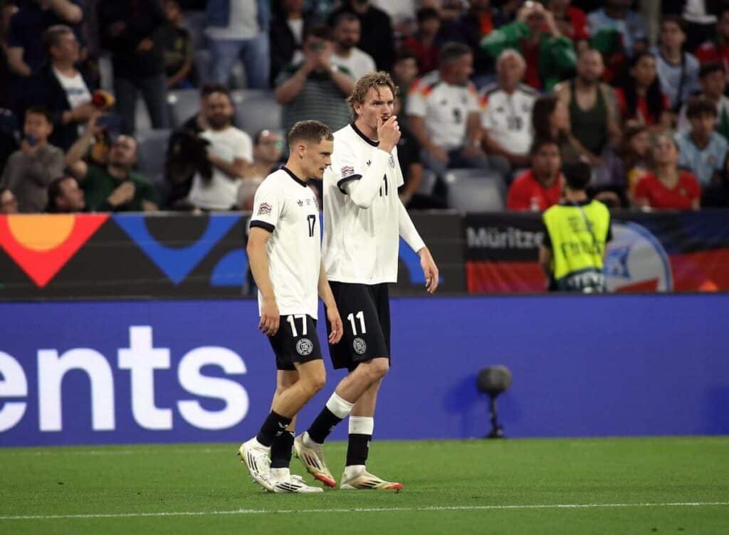 Footballers Florian Wirtz and Nick Woltemade playing for the Germany national football team