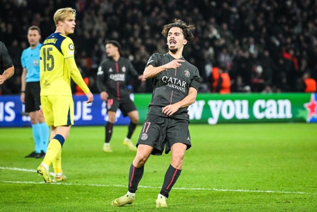 Footballer Vitinha celebrates scoring a goal for PSG