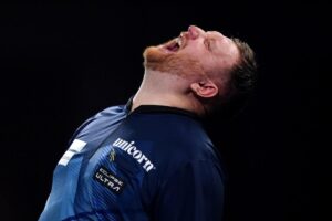 Drama at the darts as defeated Menzies leaves with bloody hand after punching table