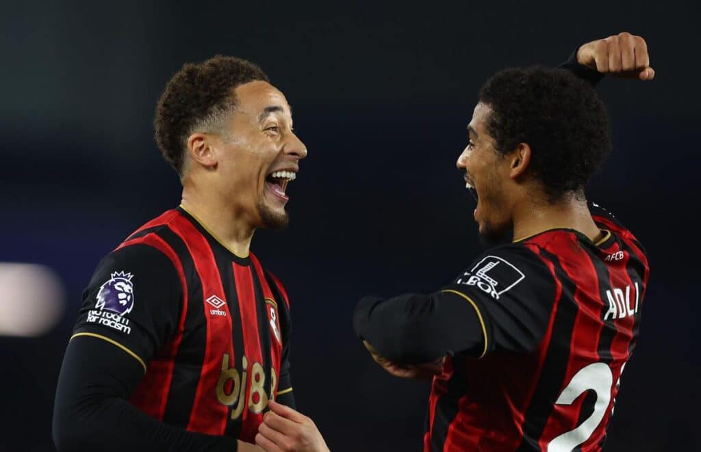 Bournemouth players celebrate a goal against Brighton