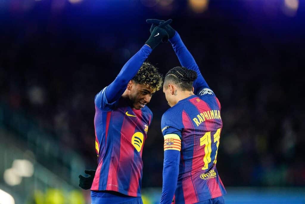 Barcelona team-mates Raphinha and Lamine Yamal celebrate