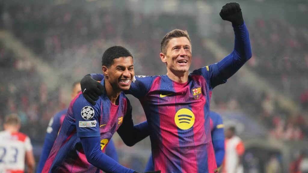 Barcelona duo Marcus Rashford and Robert Lewandowski celebrate