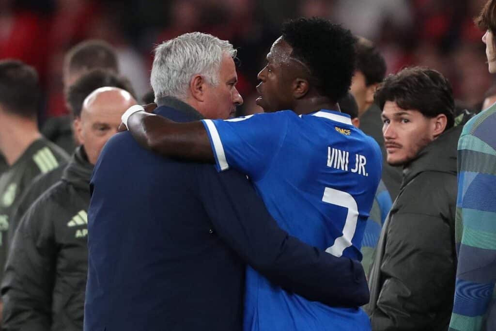 Real Madrid's Vinicius Jr and Benfica boss Jose Mourinho