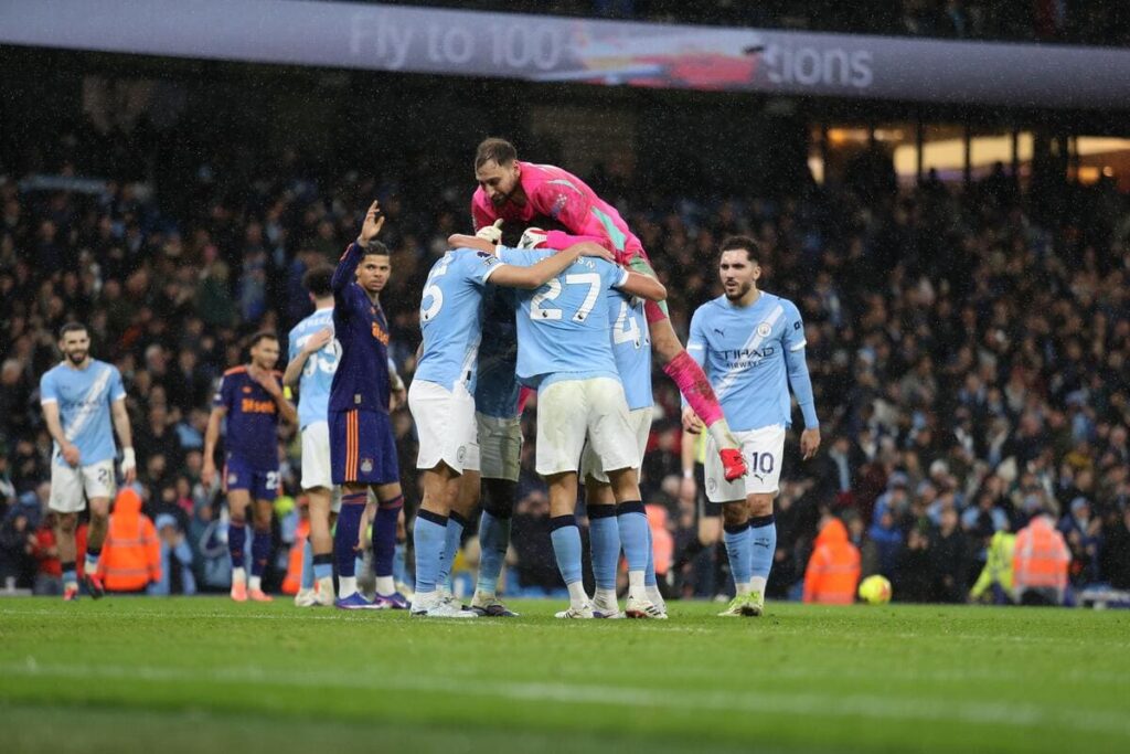 Manchester City celebrate beating Newcastle