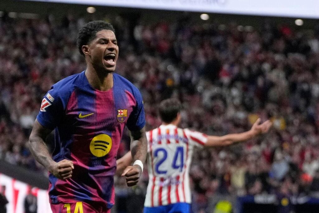 Barcelona forward Marcus Rashford celebrates his goal Atletico Madrid