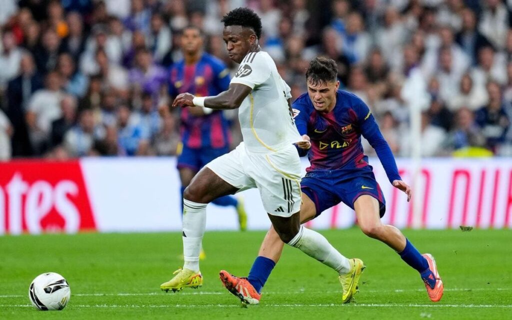 Vinicius Junior of Real Madrid in action against Barcelona