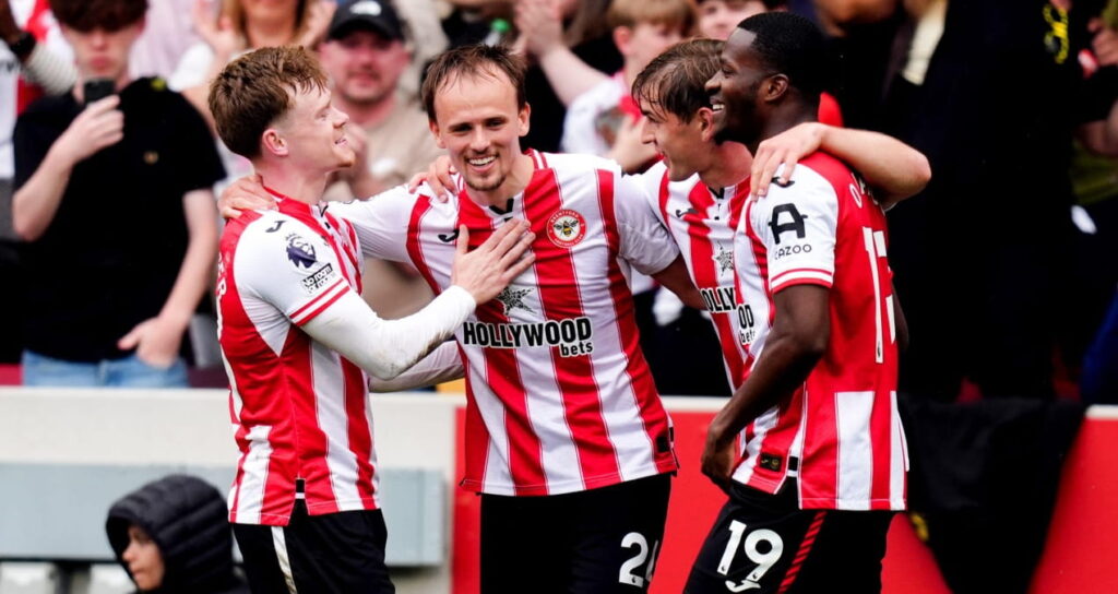Brentford players celebrate scoring against West Ham