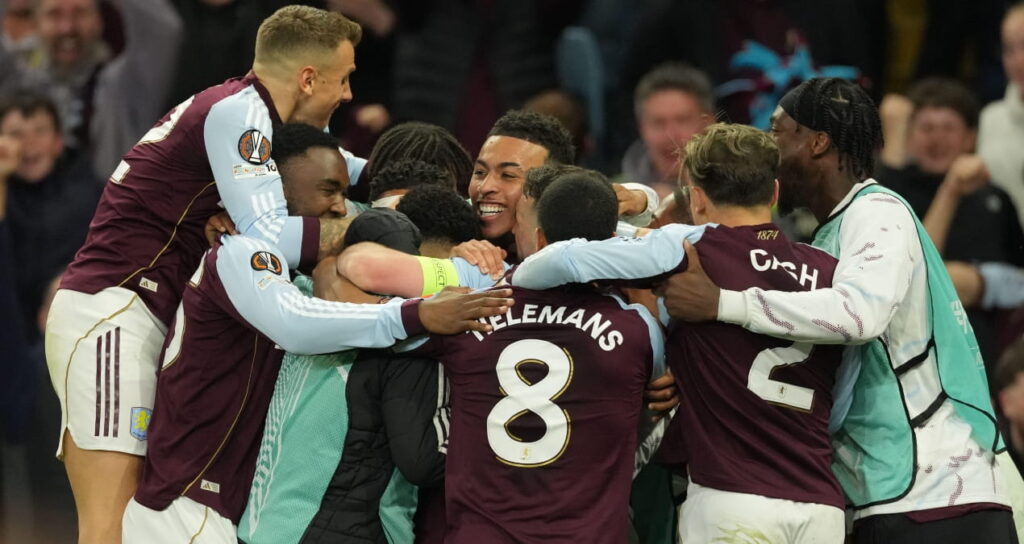 Aston Villa players celebrate scoring against Nottingham Forest