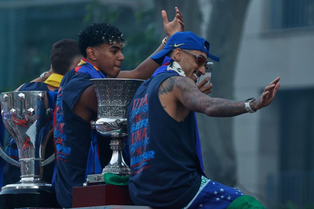 FC Barcelona players Lamine Yamal, left, and Raphinha celebrate